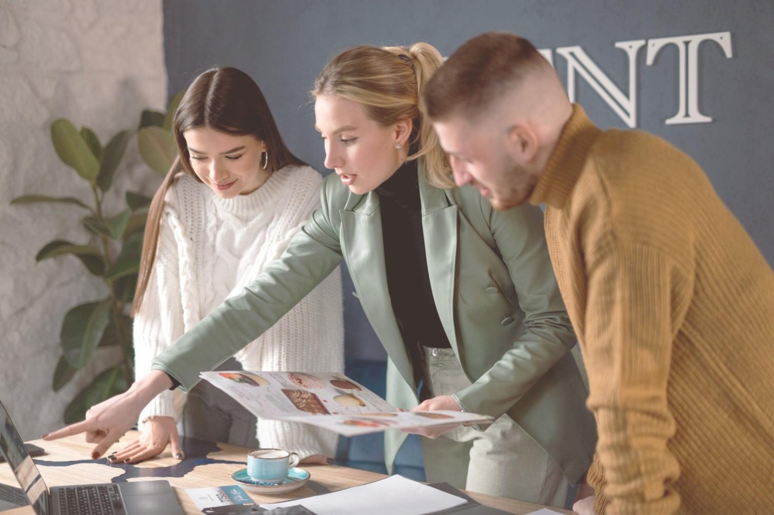 Student reviewing business plans and strategy documents during online entrepreneurship training session